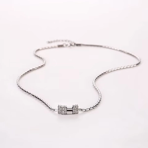 Titanium steel necklace featuring a sparkling triple-cylinder ring pendant for men and women