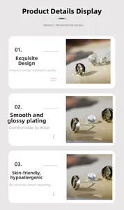 Detailed macro of vintage prayer hands earrings with electroplated finish and skin-friendly metal