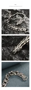 Macro shot of silver dragon scale links and intricate cloud patterns inside the bracelet
