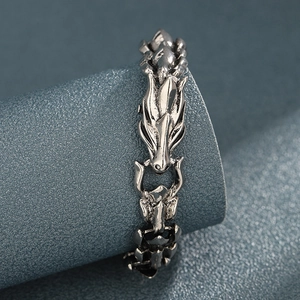 Vintage silver dragon bone bracelet with intricate dragon head carving in punk style