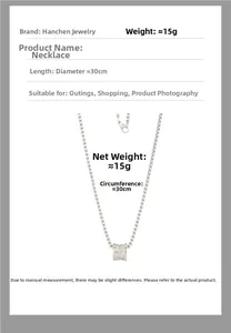 Detail view of silver titanium necklace with cylindrical pendant, 15g weight, 30cm length