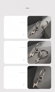 Vue détaillée des boucles d'oreilles éclair en argent et acier inoxydable poli brillant