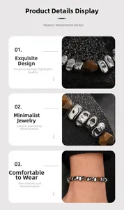 Macro shot of silver-plated irregular beads and faceted amber-toned gemstones on a bracelet