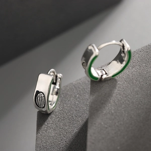 Sleek silver avocado earrings with green enamel and horseshoe buckle closure