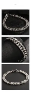 Macro details of polished silver Cuban link bracelet with a secure lobster clasp