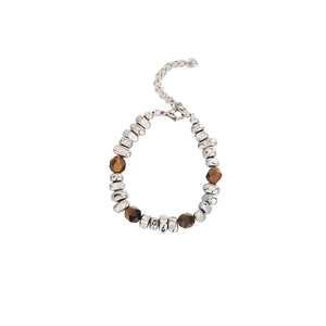 Minimalist beaded bracelet with silver metallic pieces and brown faceted amber stone beads