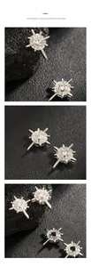 Détails des boucles d'oreilles magnétiques en étoile avec zircons noirs et blancs
