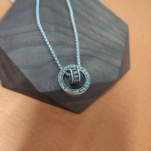 Vintage silver rotating pendant necklace with engraved six-character mantra for men