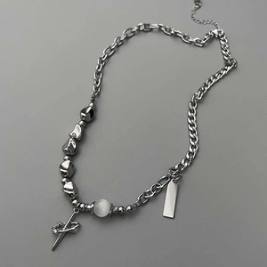 Silver punk style starburst necklace with diamond-set cross sword pendant on a link chain