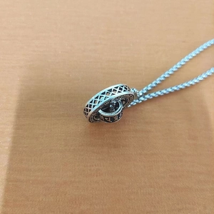 Retro silver six-word mantra mantra necklace with hollow pendant and rope chain design