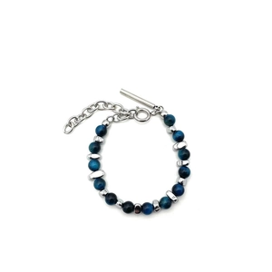 Blue tiger eye beaded bracelet with silver T-bar clasp on a clean white background