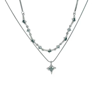 Double-layered stainless steel star necklace with green enamel and blue gemstones