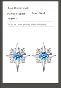 Detail of copper octagram stud earrings with polished steel finish and blue gemstone