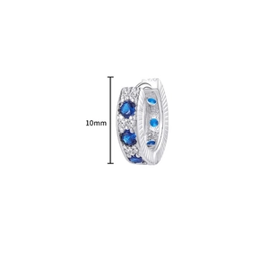 Minimalist 10mm silver huggie earrings featuring blue and white round cut zircon stones