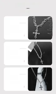 Detail view of gothic cross pendant with textured frame and thick silver chain necklace