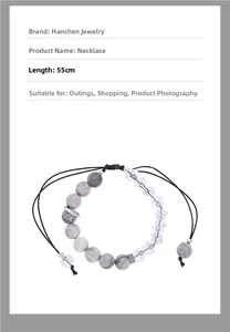 Detail showing 55cm beaded necklace with marble-patterned stones and clear faceted beads