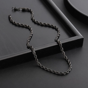 Sleek black twisted rope chain necklace for men with a minimalist hip-hop aesthetic