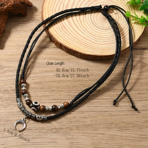 Ethnic double-layer braided necklace with wooden beads and silver crescent moon pendant