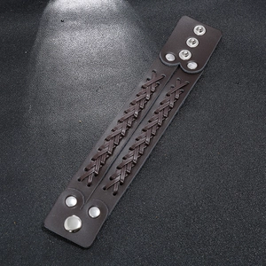 Braided dark brown leather bracelet for men with adjustable metal snaps and punk style