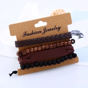 Set of 4 vintage braided leather bracelets with wooden beads and black matte charms