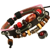 Macro detail of multi-layer vintage leather bracelet with wooden beads and woven cords
