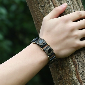 Men's retro punk leather bracelet featuring vintage bronze metal accents and floral motifs
