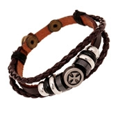 Detail view of multi-layer leather bracelet featuring cross charm and metal beads