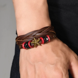 Mens vintage woven brown leather bracelet featuring a bronze star and multi-layer design