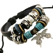 Detail of multi-layer leather bracelet featuring an engraved metal butterfly pendant charm