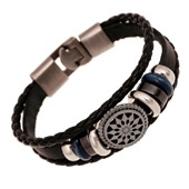 Detail of multi-layer braided leather bracelet with sunburst metal charm and plug buckle