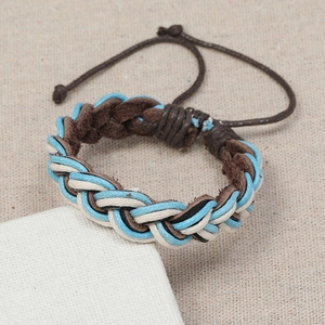 Multilayer handmade braided leather bracelet with adjustable cord shown in 45-degree angle