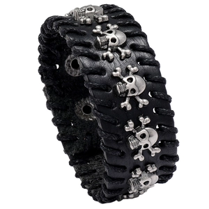 Vintage punk leather bracelet with skull studs and handmade stitching for men