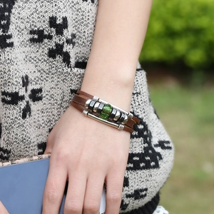 Retro multilayer leather bracelet with a green stone bead and silver alloy accents