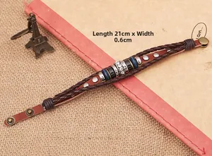 Detail of vintage braided leather bracelet with beads and 21cm size measurements
