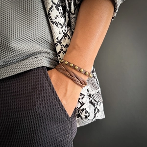 Men's retro multilayer braided leather bracelet with vintage bronze studs on wrist
