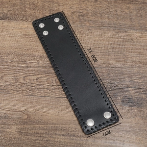 Punk style wide black leather bracelet for men with woven edges and silver snap buttons