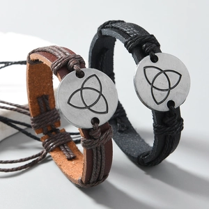 Vintage leather bracelets with Celtic Triquetra knot charms in black and dark brown