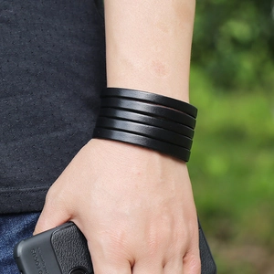 Minimalist black multilayer leather bracelet for men featuring a punk motorcycle style