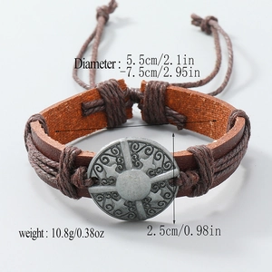 Adjustable brown braided leather bracelet with vintage engraved metal medallion ornament
