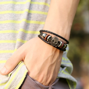 Punk multilayer leather bracelet for men featuring retro silver skull and wooden beads