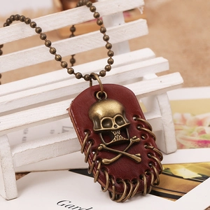 Vintage punk skull pendant on leather base with antique bronze beaded chain necklace