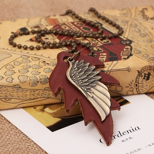 Long vintage leather leaf necklace with bronze wing charms and beaded chain pendant