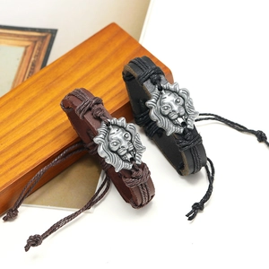 Handmade woven leather bracelets in black and brown with lion head emblem for men