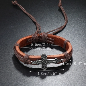 Retro woven leather bracelet with vintage silver cross and adjustable cord closure
