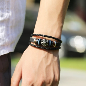 Men's layered punk leather bracelet with vintage sun totem metal charm and blue wooden beads