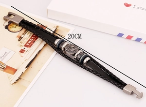 Detail of 20cm punk multilayer braided leather bracelet with skull metal plate