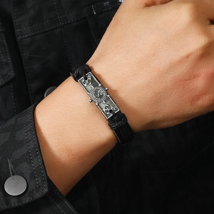 Handcrafted anchor and helm braided leather bracelet with vintage silver metal finish