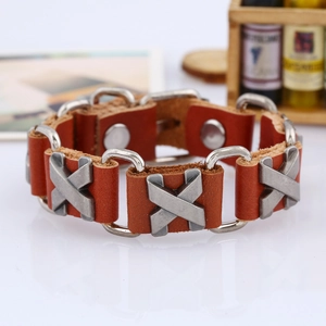Adjustable brown leather bracelet with industrial X-shaped metal accents and snap closures