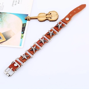 Punk style dark brown leather bracelet with star studs and silver metal buckle