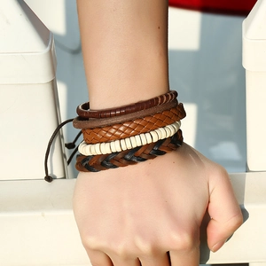 Men's retro 4-piece woven leather bracelet set in deep brown and cream tones